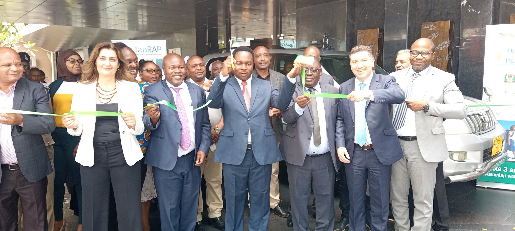 Minister cutting TanRAP launch ribbon