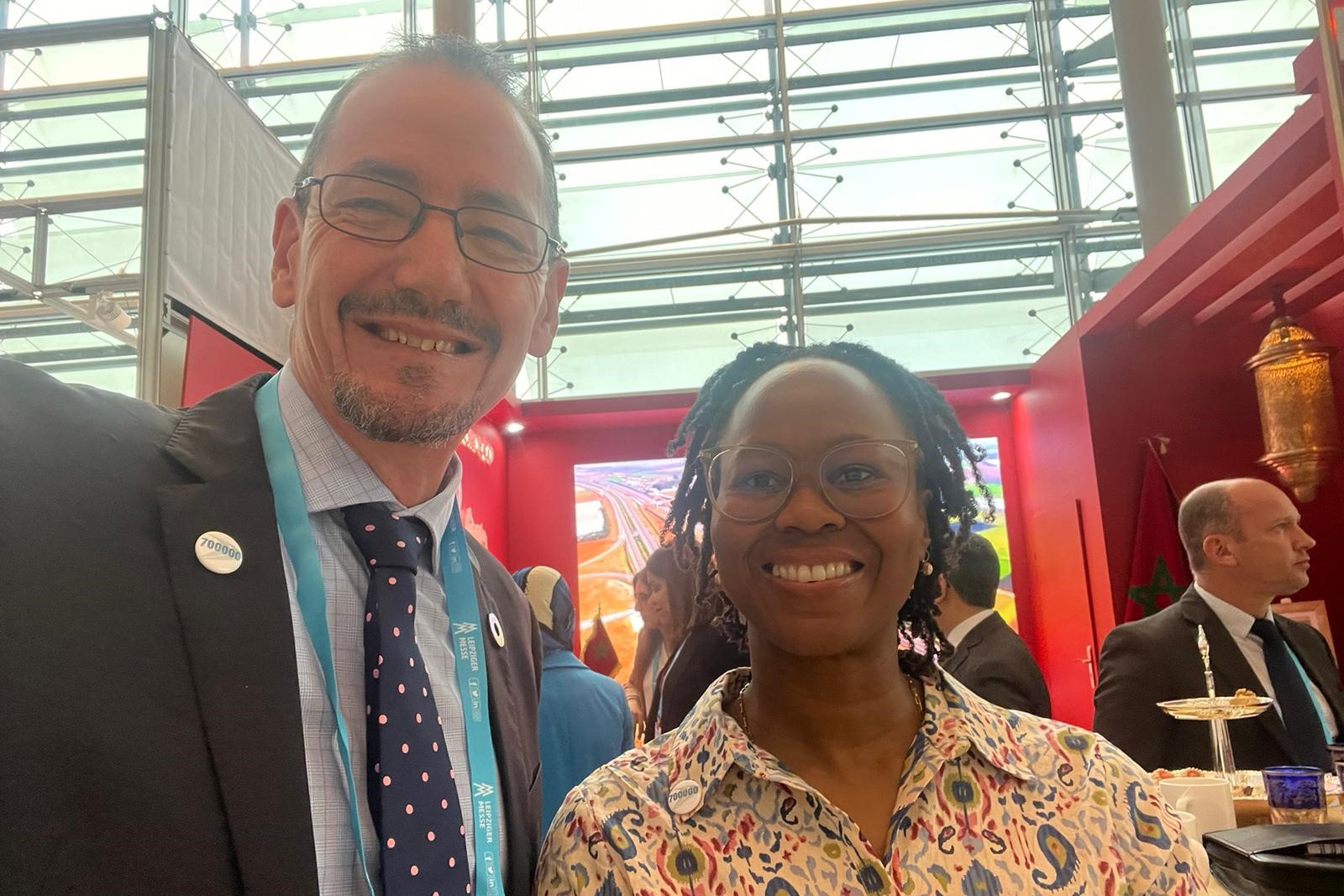 Nneka and Rob with the 700000 badge 2024 ITF