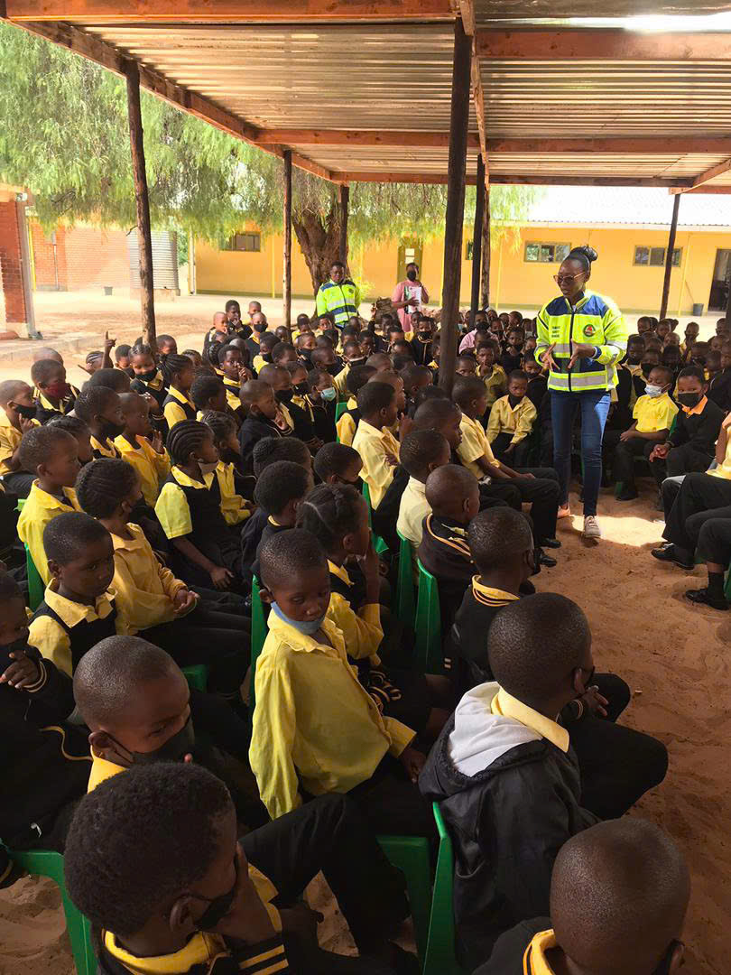 Belindah providing guidance to students in Letlhakeng District on school zone safety