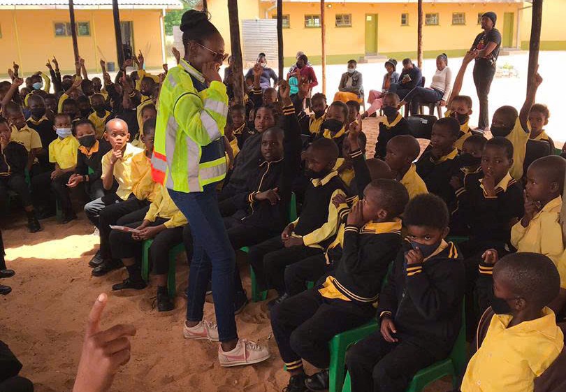 Belindah providing guidance to students in Letlhakeng District on school zone safety_1